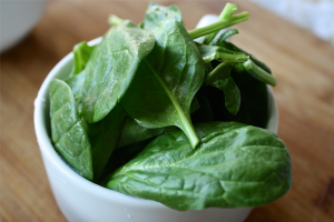 fresh spinach in a bowl.